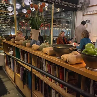 people sitting at a table in a restaurant