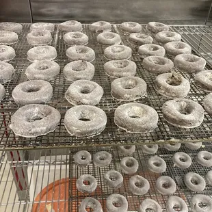 a rack of glazed donuts