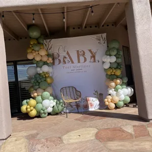 Baby shower backdrop with balloons