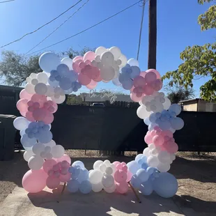 Gender reveal balloon arrangement
