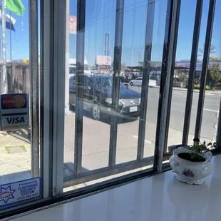 a view of a parking lot through a window