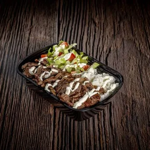 RICE BOWL-Beef n lamb or chicken, rice, tomato, pickles, lettuce, tzatziki sauce.