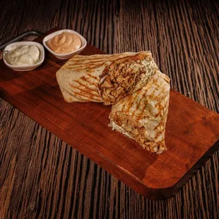 Armenian Chciken Wrap-Lavash flatbread, chicken, tomato, cabbage, cucumber, Navat red sauce, Navat white sauce