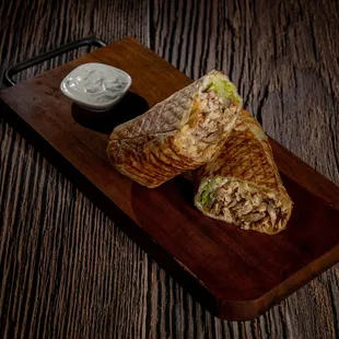 Greek Chicken Wrap - Chicken, tomato, pickles, French fries, lettuce, tzatziki sauce