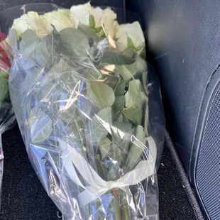 This bouquet required a $5.00 fee for an upgrade wrap and a bow.