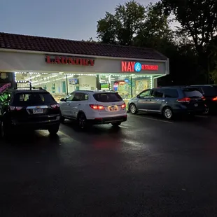 cars parked in front of the restaurant