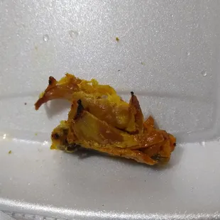 The chicken was like broken pieces and very dry.     Or do someone think delivery driver took a bite out of it?