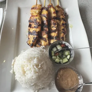 chicken skewers and rice