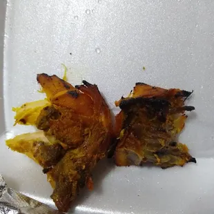 The chicken was like broken pieces and very dry.     Or do someone think delivery driver took a bite out of it?