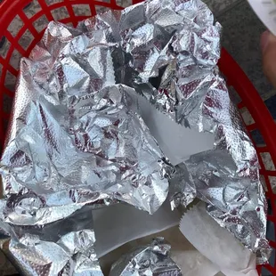 a person holding a plate of food