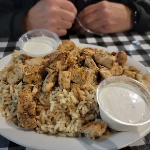 a plate of chicken and rice