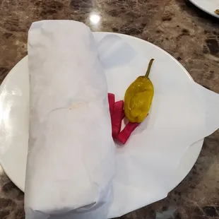 Pita sandwich comes rolled up