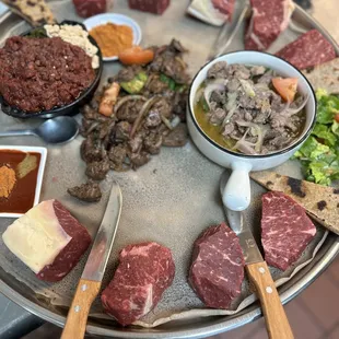 Kurt,freshly cut lamb tibs, tender beef tibs, and Nazret Kitfo special.