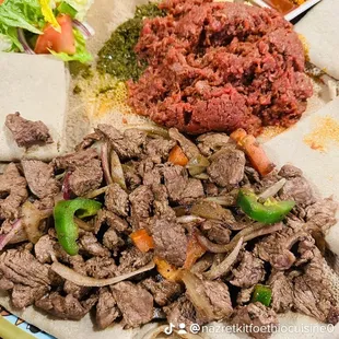 a plate of meat and vegetables