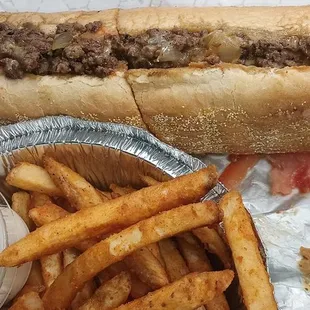 Chopped cheese with seasoned fries with white sauce