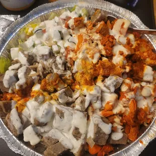 a plate of nachos with sauce