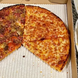 We had one cheese and one meat-lovers pizzas and an Italian coconut cake.