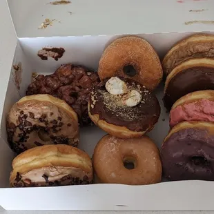 Started out as a dozen but by the time we got home we lost a couple of plain glazed ones. Delicious