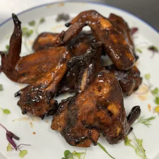 Chicken Wings. Available in Buffalo, Lemon Pepper, Garlic Parmesan, and Jerk.