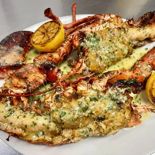 a plate of grilled lobsters