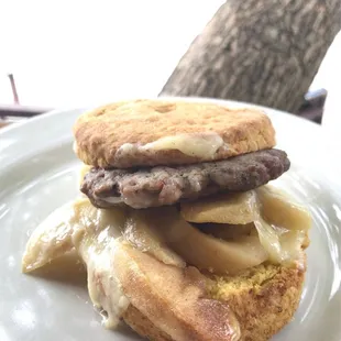 Sausage, Chedder, and Fried Apples on a Sweet Potato Biscuit