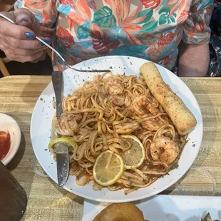 Shrimp scampi with marinara sauce