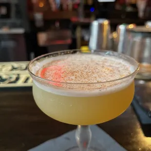 Custom crafted bourbon-mezcal pineapple cocktail