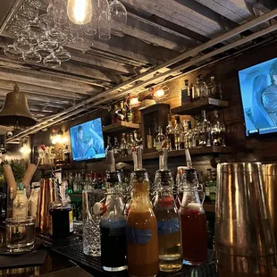 a variety of beverages on the bar