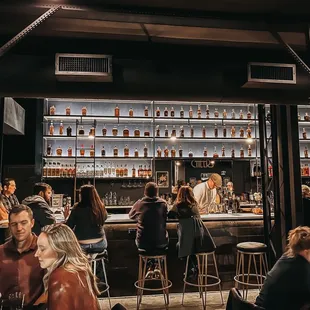 people sitting at the bar