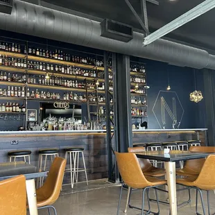 a bar with lots of bottles