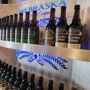 a wall of beer bottles