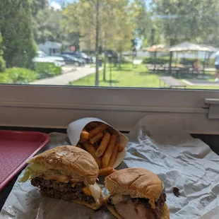Combo of dbl cheeseburger (half)with fries $14.50 and half chicken sandwich