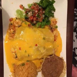 Enchiladas Del Mar with queso on top