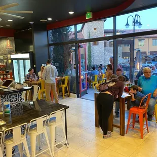a group of people sitting at a table