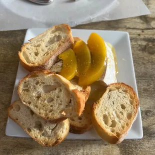 a plate of bread and pickles