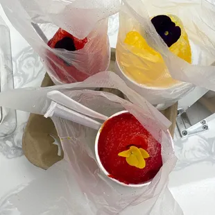 a variety of desserts in plastic bags