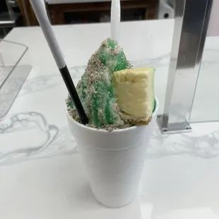 Pistachio stuffed snowball with plain cheesecake