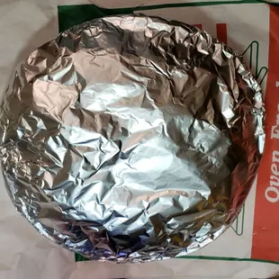 Another package inside the take and bake pizza.