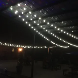 a string of lights hanging from a roof