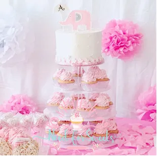 a cake and cupcakes