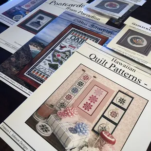 Cross stitch patterns and mini cross stitch kits.