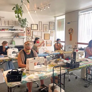 Stitch X Stitch Sewing For Beginners Class hard at work