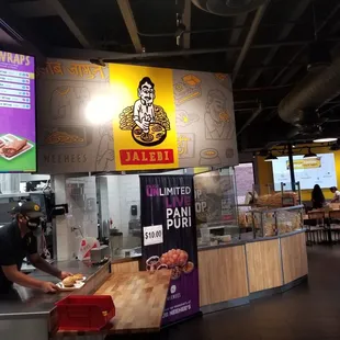 a man preparing food in a restaurant