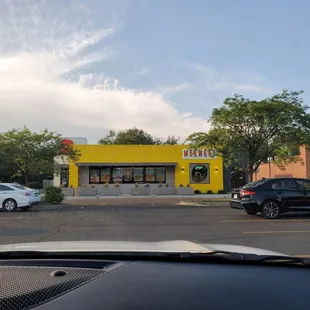 a view of a yellow building