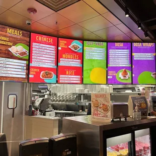 a restaurant with menus on the wall