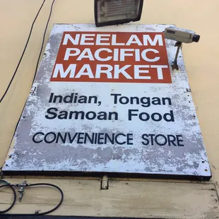 a sign for a convenience store