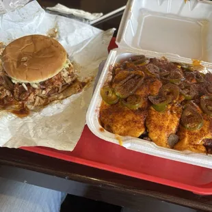 Brisket nachos and pork sandwich