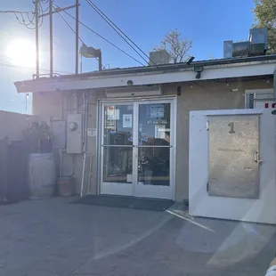 a teddy bear outside a store