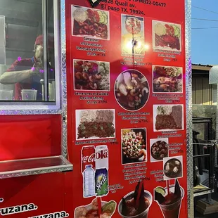 a menu on a food truck