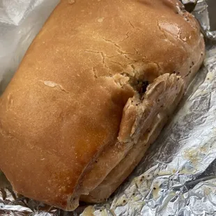 Jerk chicken sandwich on coco bread